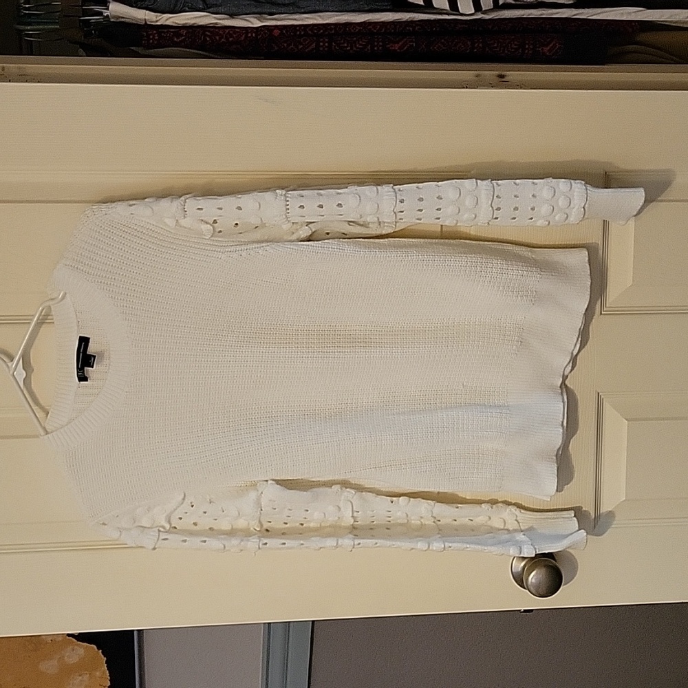 Cream sweater with decorative sleeves